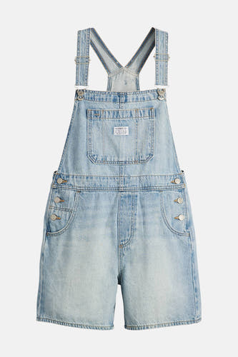 Combinaison en denim bleu clair de Levi's®, avec des bretelles ajustables et des boutons argentés.