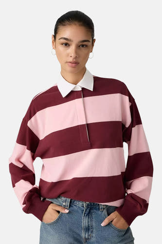 Gilet multicolore de Levi's®, avec un motif rayé rose et bordeaux et une encolure blanche.