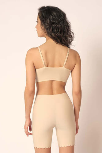 Peau beige de SKINY, avec des bandes fines, vue de derrière.