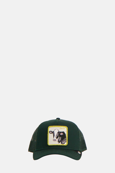 Chapeau vert de Goorin avec une patch carrée d'une vache noire et blanche à l'avant.