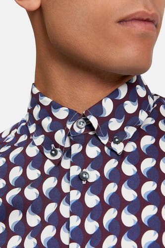 Chemise bleue à manches longues de BEN SHERMAN, avec un motif distinctif et une fermeture à boutons.