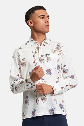 Chemise multicolore à manches longues de BEN SHERMAN, avec un motif floral et des boutons de manchette visibles.