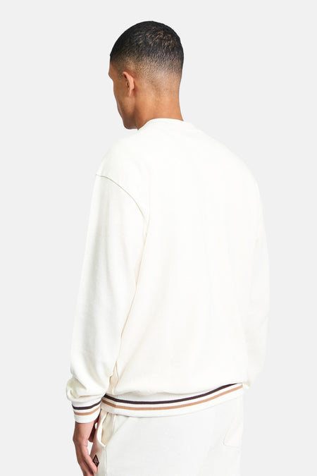 Ecru sweater van BEN SHERMAN, met lange mouwen en gestreepte boorden.