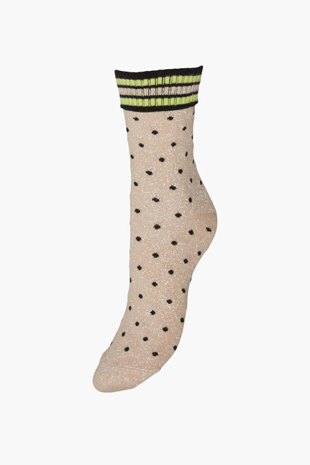 Chaussette beige pailletée de VERO MODA® avec des pois noirs et un bord à rayures noires et vertes.