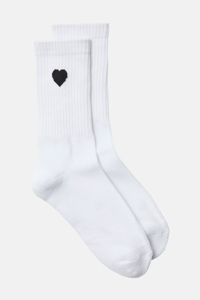 Chaussettes blanches de VERO MODA, avec un petit cœur noir sur la tige.