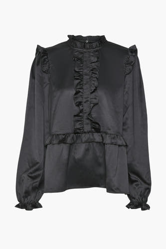 Blouse noire à manches longues de VERO MODA, avec des volants au col et à l'avant.