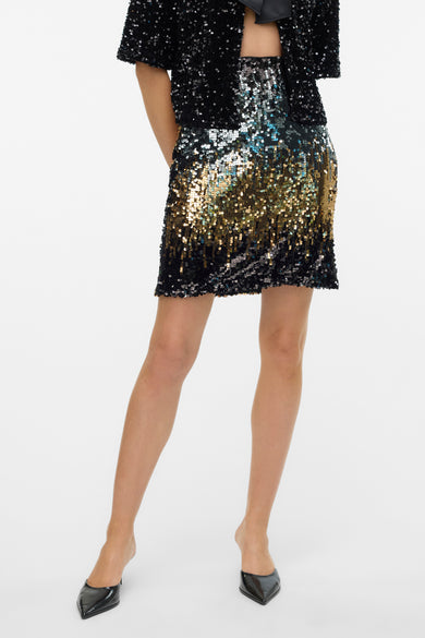 Jupe courte noire de VERO MODA, avec des strass dorés et noirs.