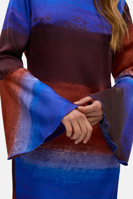 Doudoune multicolore à longues manches de VERO MODA, avec un imprimé aquarelle abstrait et des manches bouffantes.