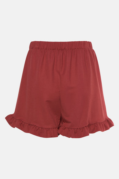Short rouge de Vero Moda avec une ceinture élastique et un bord froncé.
