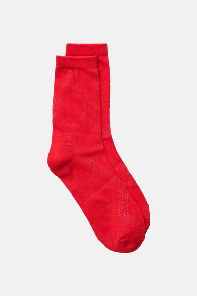 Chaussettes rouges de VERO MODA avec un motif de carreaux subtil.