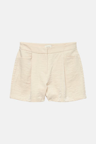 Crème court de VERO MODA, avec plis à l'avant et poches.