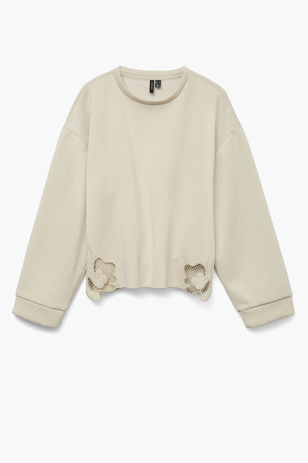 Gilet écru de VERO MODA® avec des manches longues et des découpes décoratives en bas.