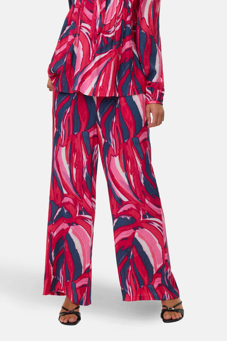 Multicolour broek van VERO MODA, met een bladeren patroon en wijde pijpen.
