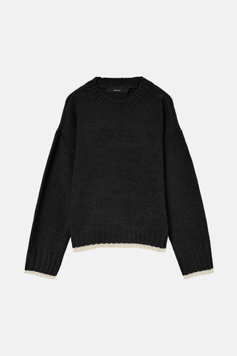 Pull noir avec col rond de VERO MODA, avec des manches longues et un bord côtelé.