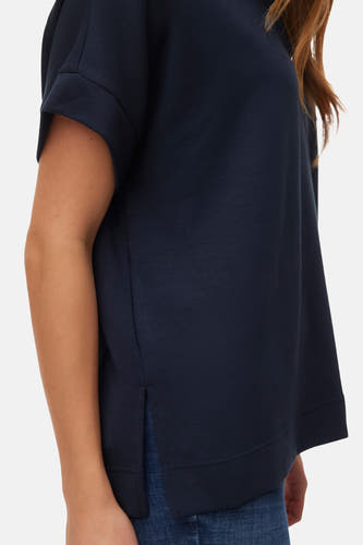 T-shirt bleu à manches courtes de VERO MODA, en tissu doux et avec des coutures laterales au col.