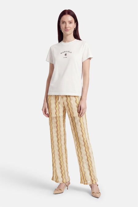 Meerkleurige gehaakte broek van VERO MODA met golvend streepdessin en trekkoord in de taille.