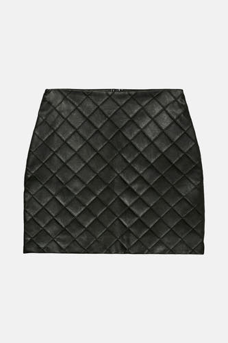 Jupe courte noire VERO MODA avec un motif à carreaux effiloché sur toute la surface.