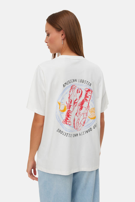 T-shirt blanc VERO MODA® avec un imprimé homard rouge et le texte 'AMERICAN LOBSTER' au dos.