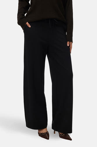Pantalon noir de VERO MODA, avec des jambes larges et une ceinture élastiquée.