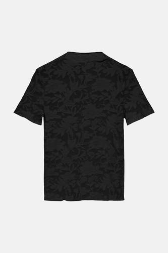 T-shirt noir à manches courtes de Vero Moda, avec un motif floral ton sur ton sur l'ensemble du t-shirt.