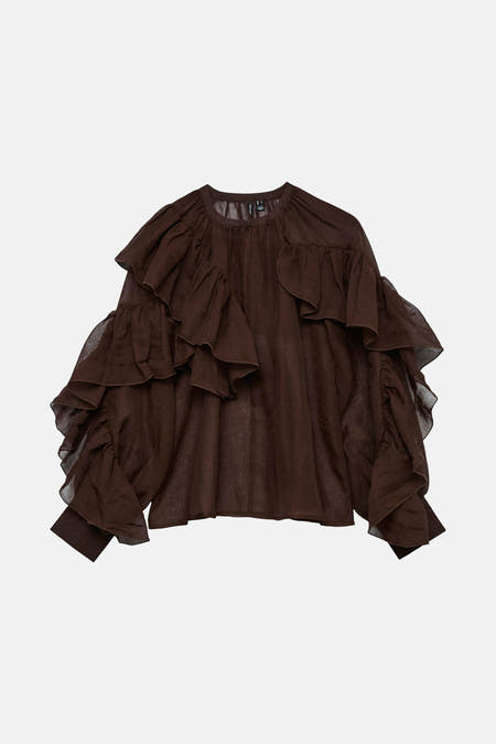 Blouse brune à longues manches de VERO MODA®, avec des bretelles et un tissu légèrement transparent.
