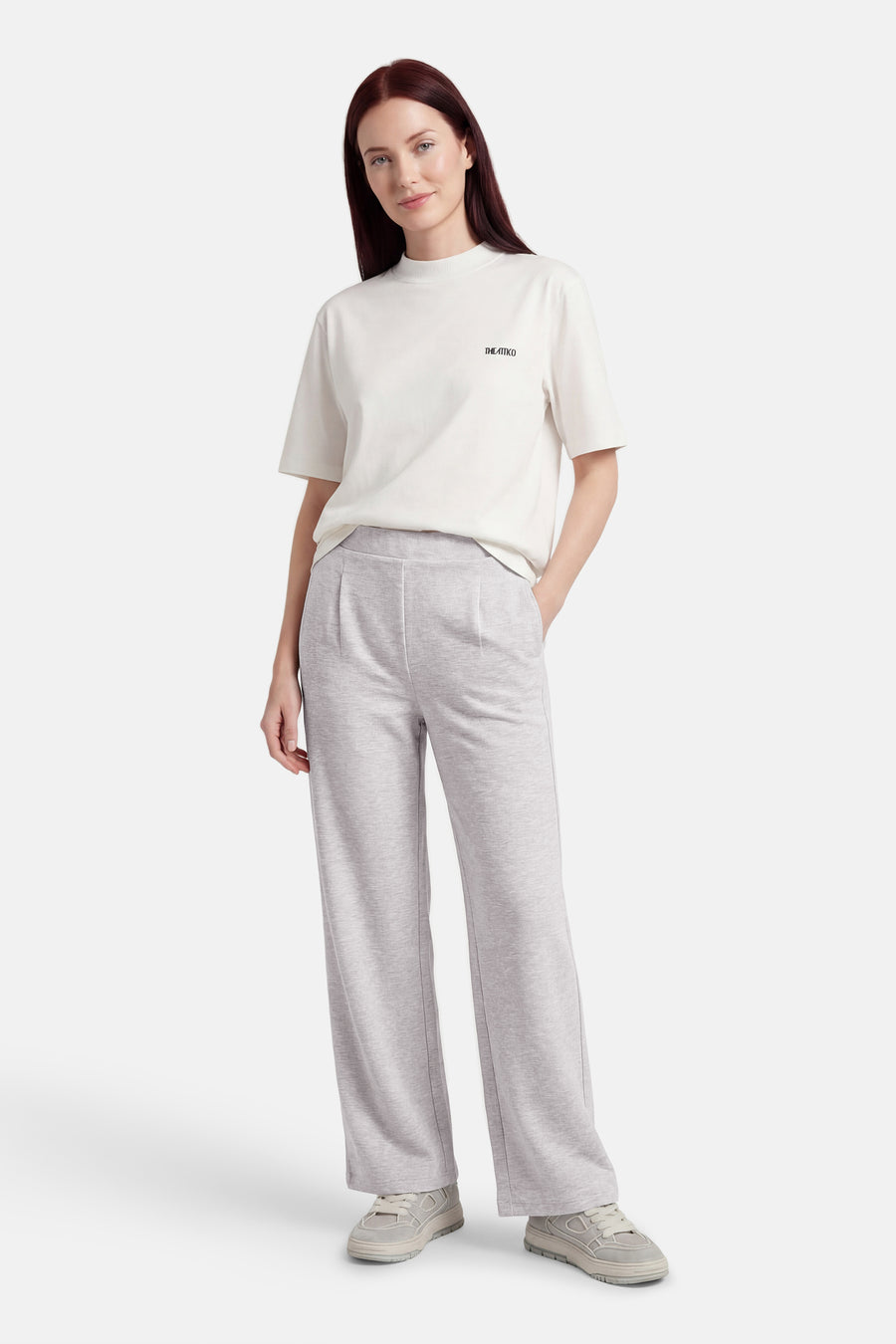 Pantalon gris de VERO MODA, avec des jambes larges et une coupe confortable et décontractée.