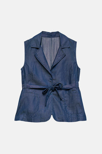 Gilet en jean bleu foncé de VERO MODA®, avec col et ceinture à l'arrière.