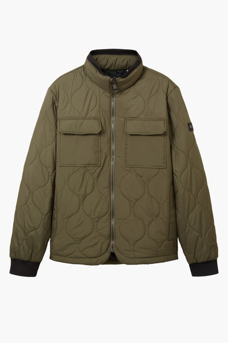 Manteau court vert de TOM TAILOR, avec un motif de visage en duvet et deux poches po poitrine.