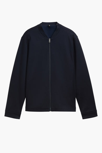 Manteau bleu court de TOM TAILOR avec des manches longues et une fermeture à glissière devant.