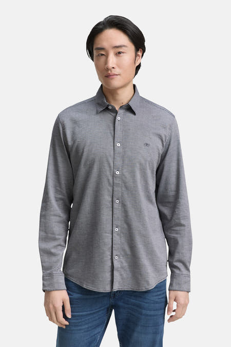 Blau,, longs manches T-shirt TOM TOM TOROR, tissu lisse avec des boutons blancs.