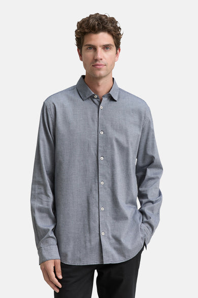 Chemise bleue à manches longues de TOM TAILOR, avec un motif subtil et des boutons blancs.