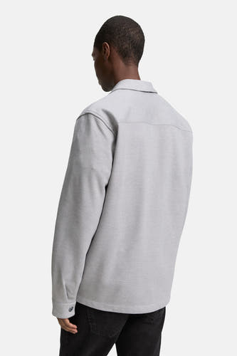 Chemise grise de TOM TAILOR, dos, avec des manches longues et un jeans noir.