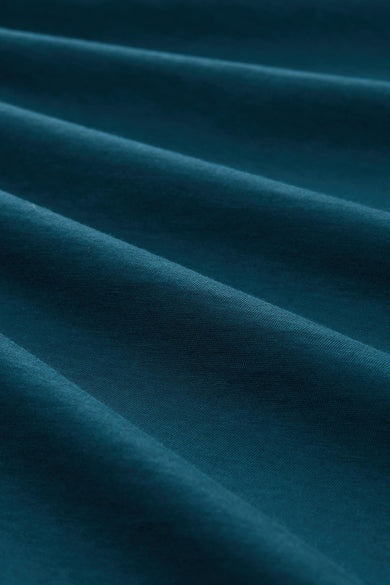 Turquoise T-shirt met korte mouwen van TOM TAILOR, met een subtiele textuur en plooien in de stof.