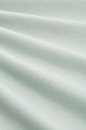 Pull vert de TOM TAILOR, avec des plis doux et une texture subtile.