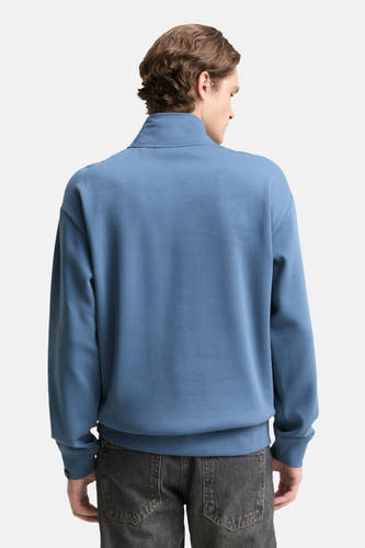 Gilet bleu à col montant de TOM TAILOR, avec des manches longues, vu de l'arrière.