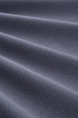 Gilet bleu de TOM TAILOR avec une fine structure à carreaux et des plis subtils.