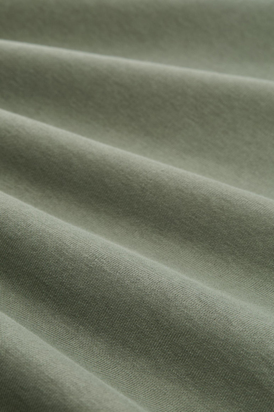 Groene sweater van TOM TAILOR, met gedetailleerde stoftextuur en plooien.
