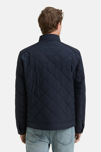 Veste courte bleue de TOM TAILOR, avec un motif matelassé en losange au dos.