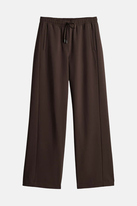 Pantalon de costume marron OPUS, avec cordon de serrage et jambes larges.