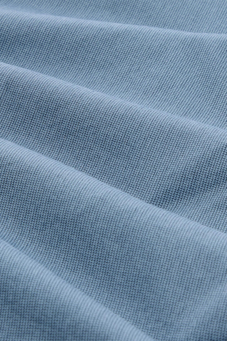 Bermuda bleu de TOM TAILOR, avec texture froissée dans un motif tissé.