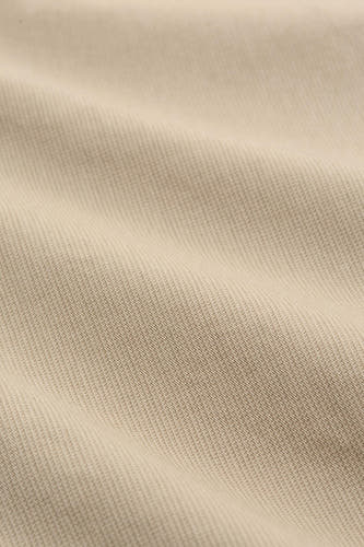 Bermuda beige de TOM TAILOR, avec une texture subtile et des plis doux.