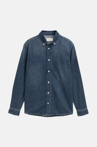 Chemise en jean bleu foncé de TOM TAILOR, avec boutons apparents et surpiqûres détaillées dans le tissu.