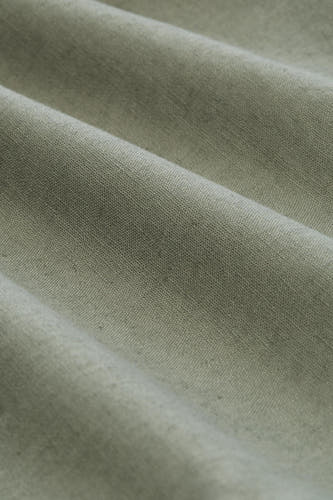 Short vert TOM TAILOR de couleur verte avec une texture subtile et une coupe confortable et plissée.