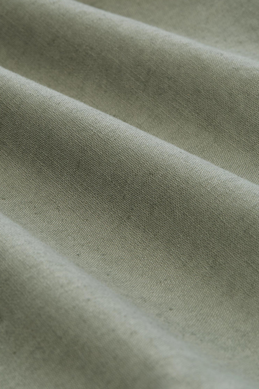 Short vert TOM TAILOR de couleur verte avec une texture subtile et une coupe confortable et plissée.