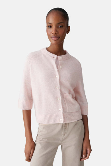 Gilet rose OPUS, à manches longues et col rond.