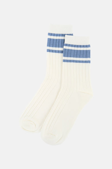 Chaussettes Birdland côtelées blanches à rayures bleues avec une étiquette blanche affichant le logo et la taille 37-41.