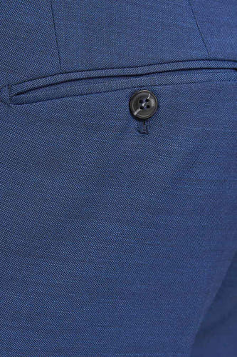 Blazer bleu de PREMIUM par JACK & JONES, avec détail de bouton sur la poche arrière et fine texture en laine.