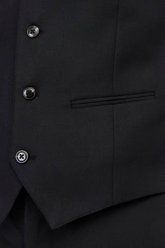 Gilet noir de PREMIUM par JACK & JONES, avec fermeture à boutons et une poche po.