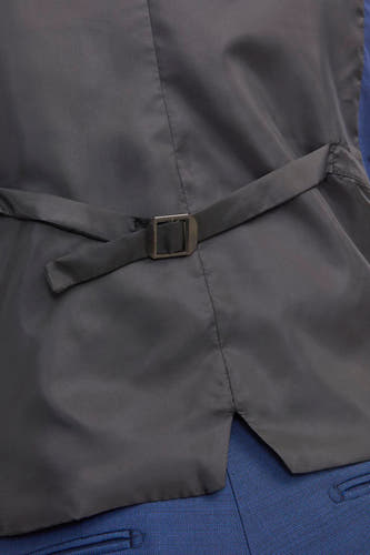 Gilet bleu de PREMIUM par JACK & JONES, avec une ceinture ajustable et des détails de texture subtils.