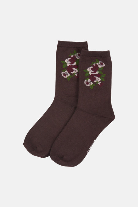Chaussettes marron foncé BIRDLAND avec un motif de roses roses et bordeaux et de feuilles vertes.